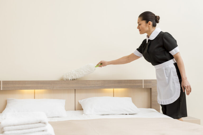 chambermaid-preparing-hotel-room (1)